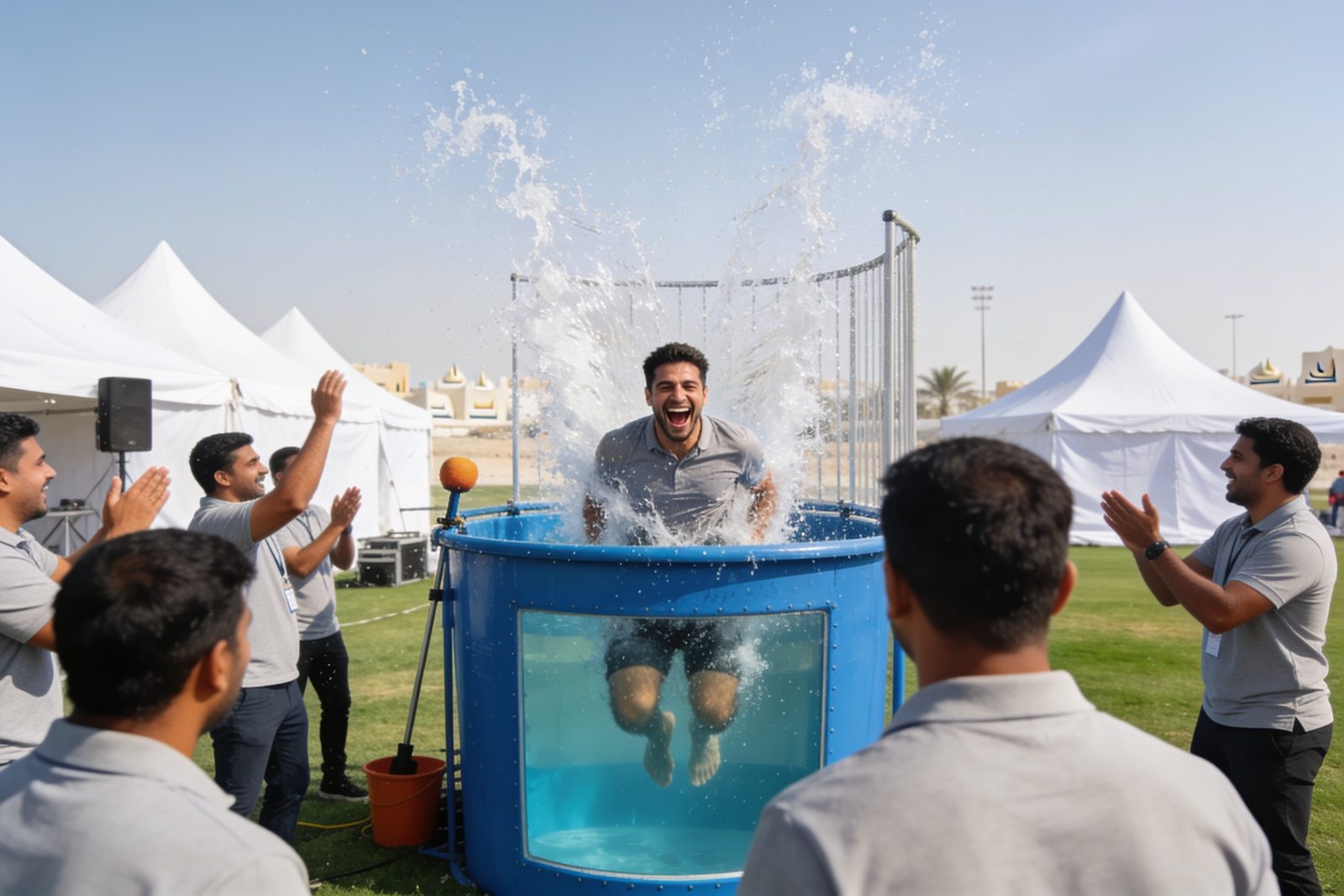 Water splash from a dunk tank during a company family day in Dubai