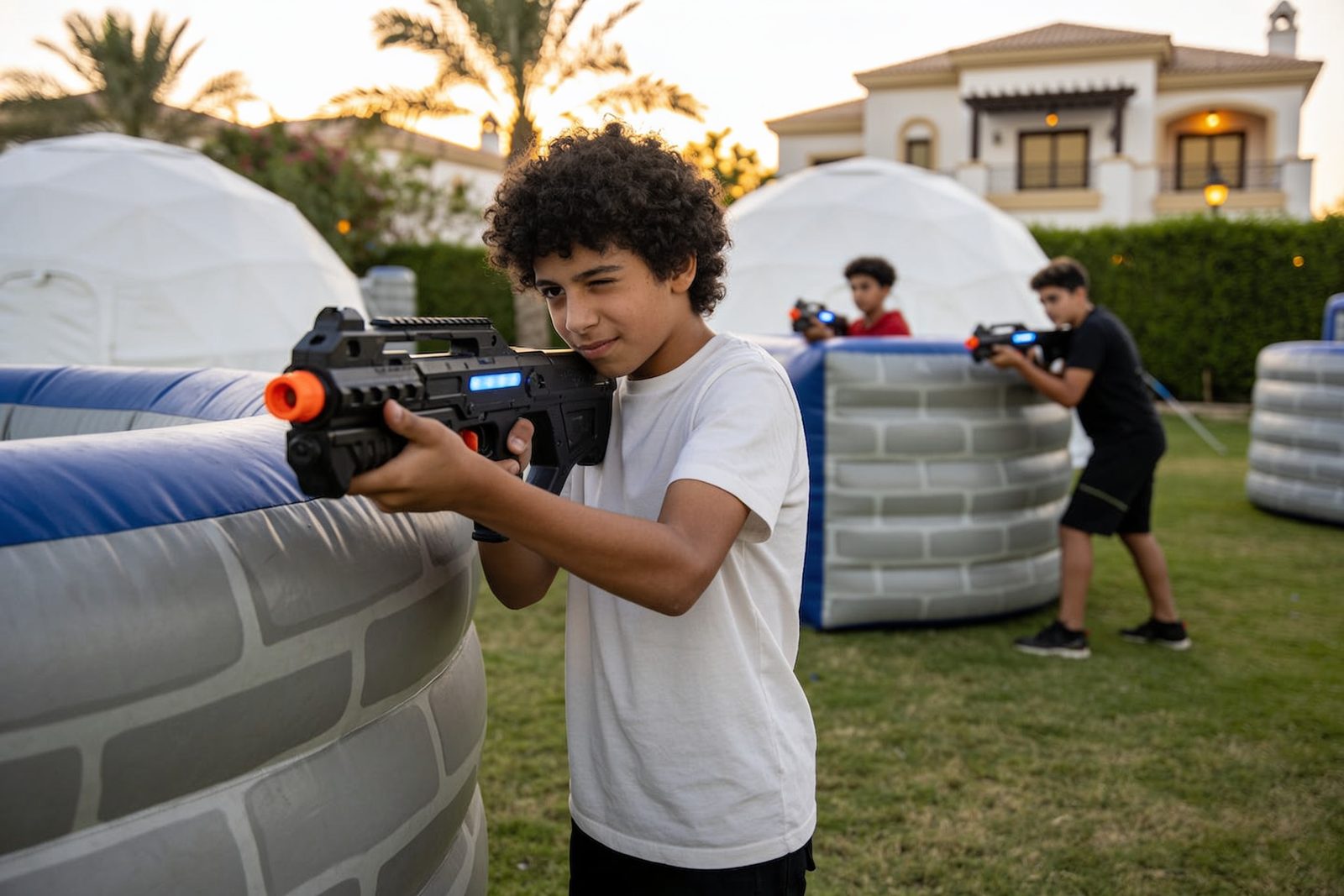 Children enjoying laser tag during a Dubai birthday party